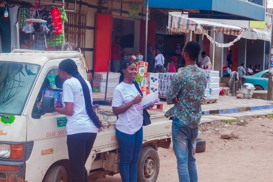 Distributing awareness materials near a delivery truck